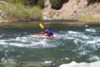 kayaking in moderate rapids in Sierra County